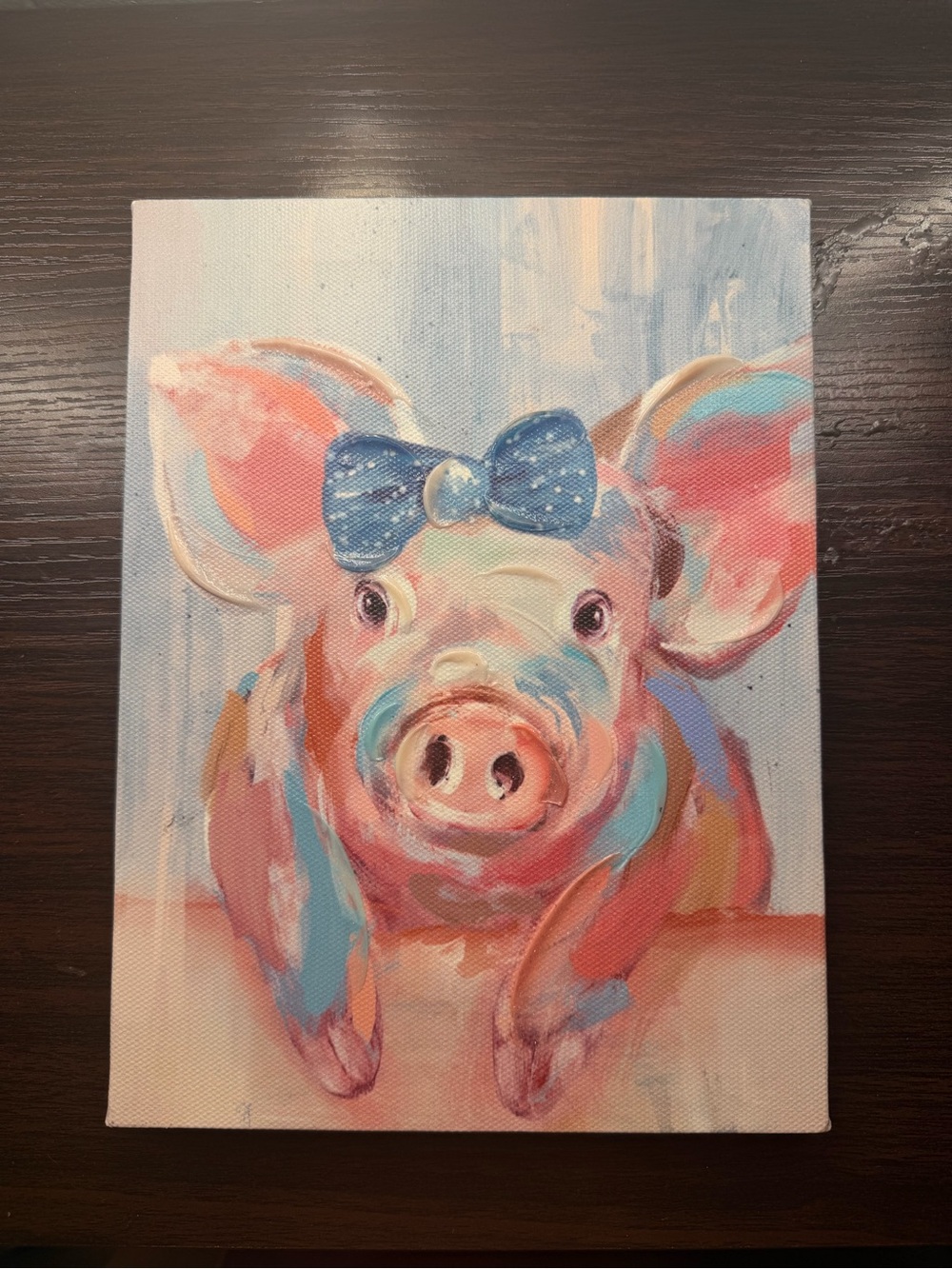 Colorful Piglet Canvas Art with Blue Bow Accent